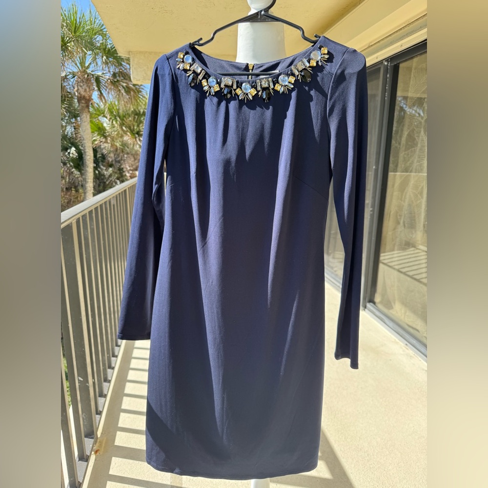 Size 2 dark blue Vince Camuto Dress. 
Material is polyester and spandex.